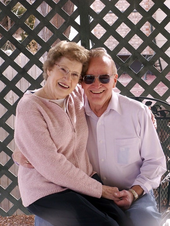 happily married elderly couple smiling