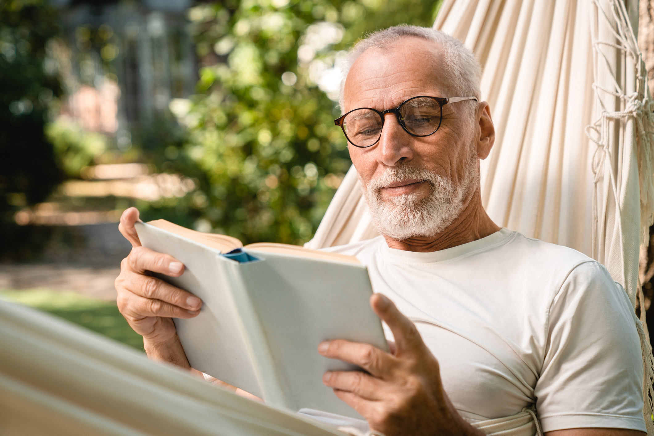 man-reading-book-about-managing-anxiety