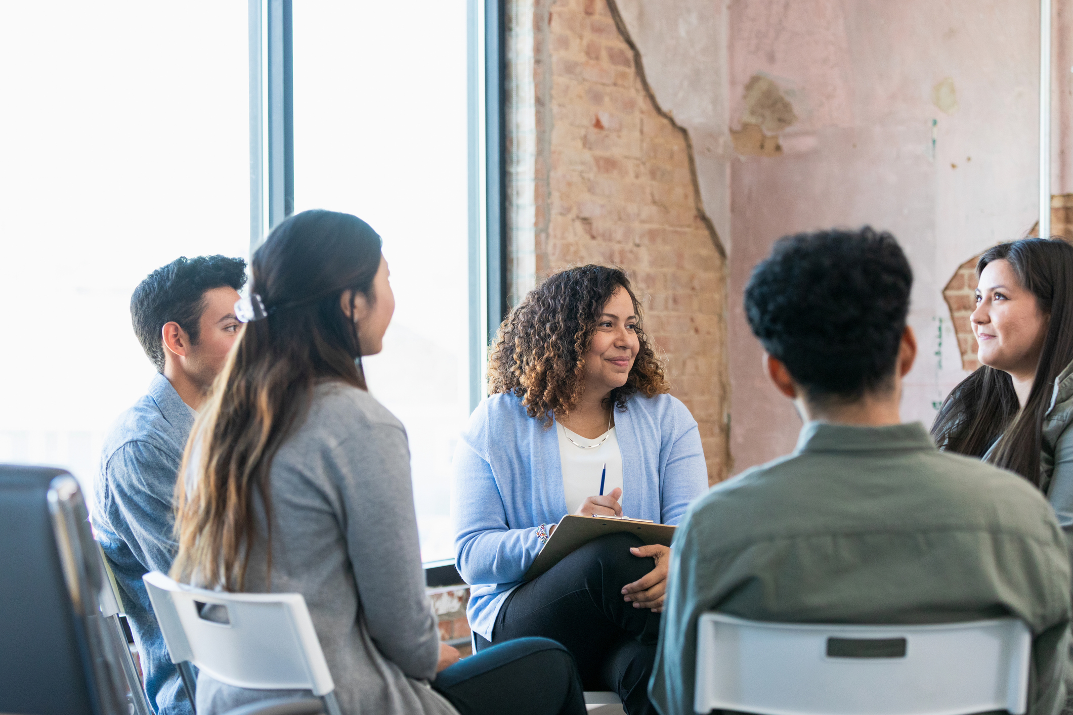 coworkers-discussing-mental-health-at-work